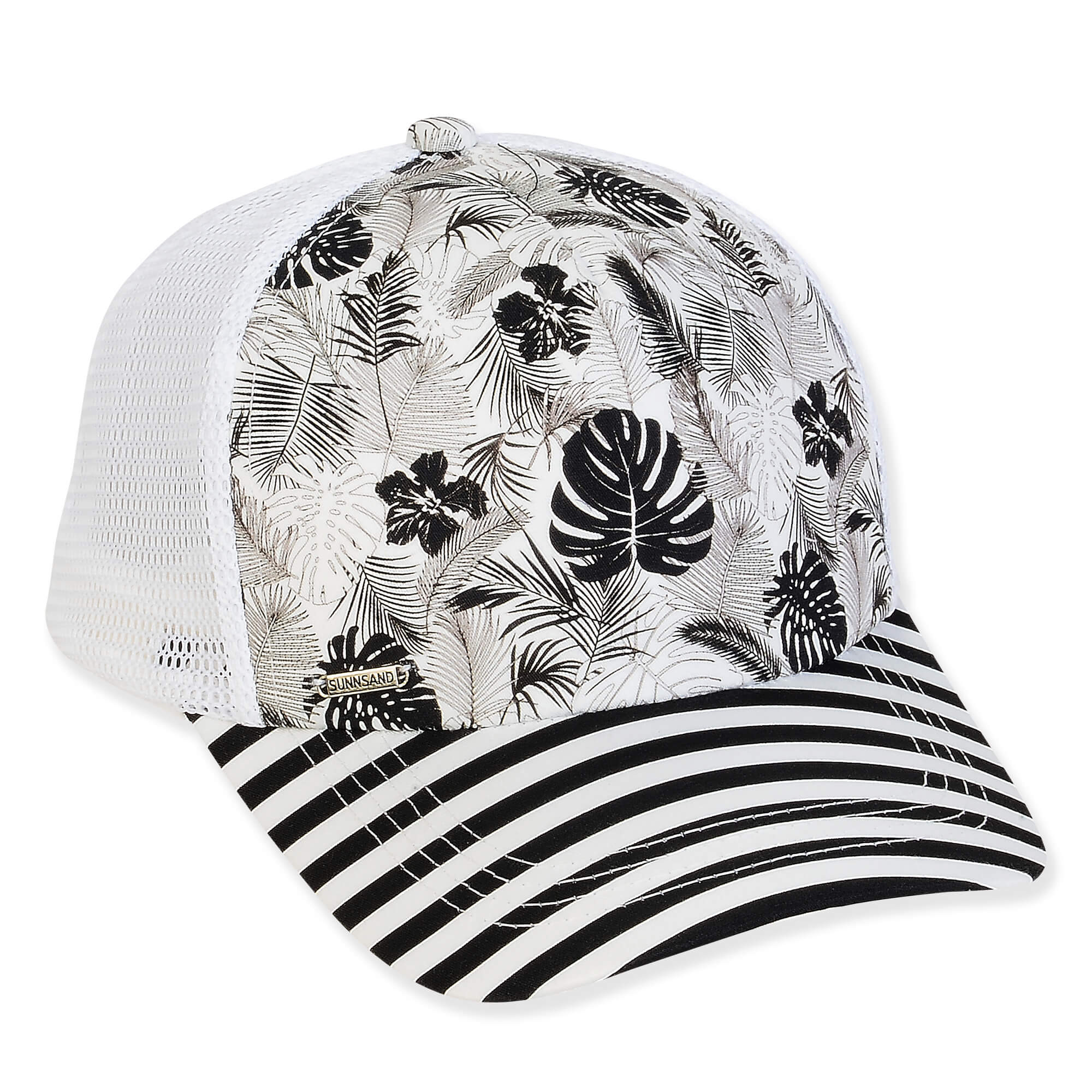 Front view of black‑and‑white tropical trucker cap featuring floral leaf crown pattern, striped brim, and breathable white mesh back panels.