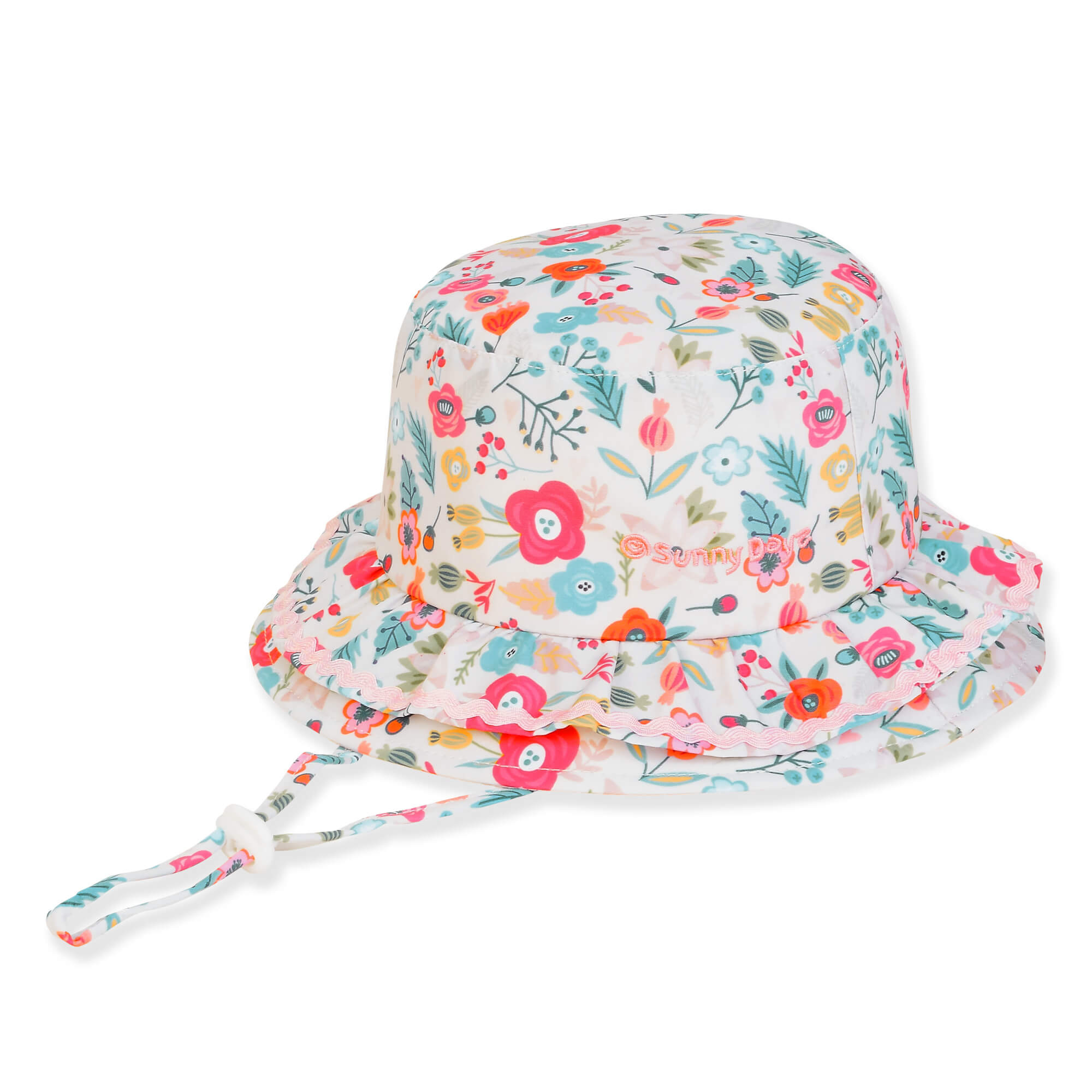 Three-quarter view of a white kids' sun hat featuring a colorful wildflower print, ruffled brim, and an adjustable chin strap.