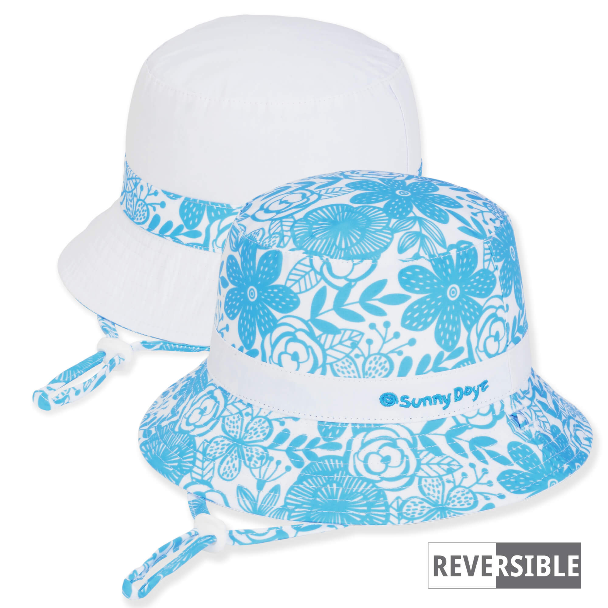 Three-quarter view of a reversible kids' bucket hat featuring a light blue floral print side and a solid white side.