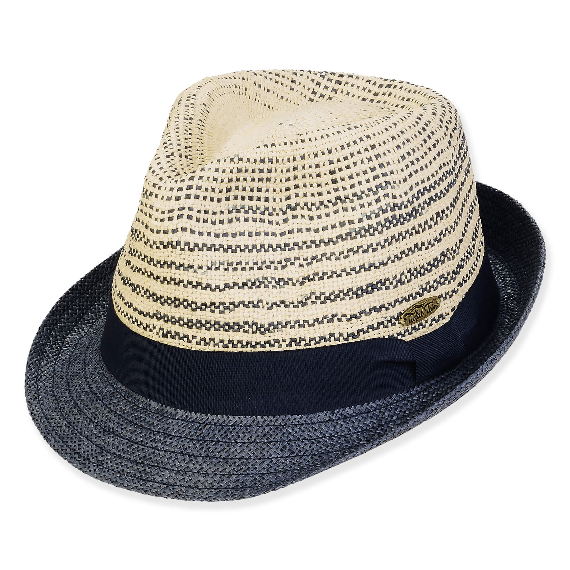 Three-quarter view of a cream and navy patterned straw fedora featuring a solid navy band and oval metal logo.
