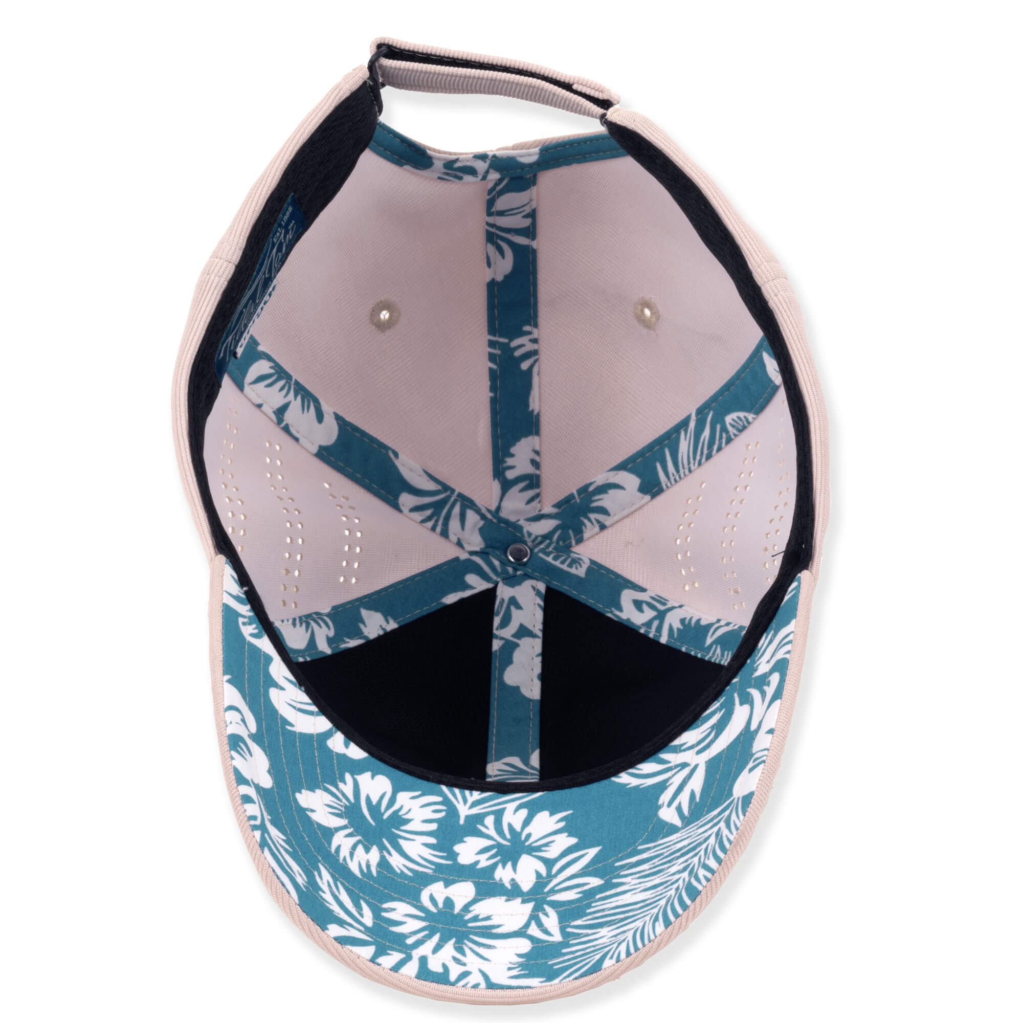 Underbrim View  of a light beige baseball cap with a textured fabric, adjustable strap hardware, and a patterned inner lining