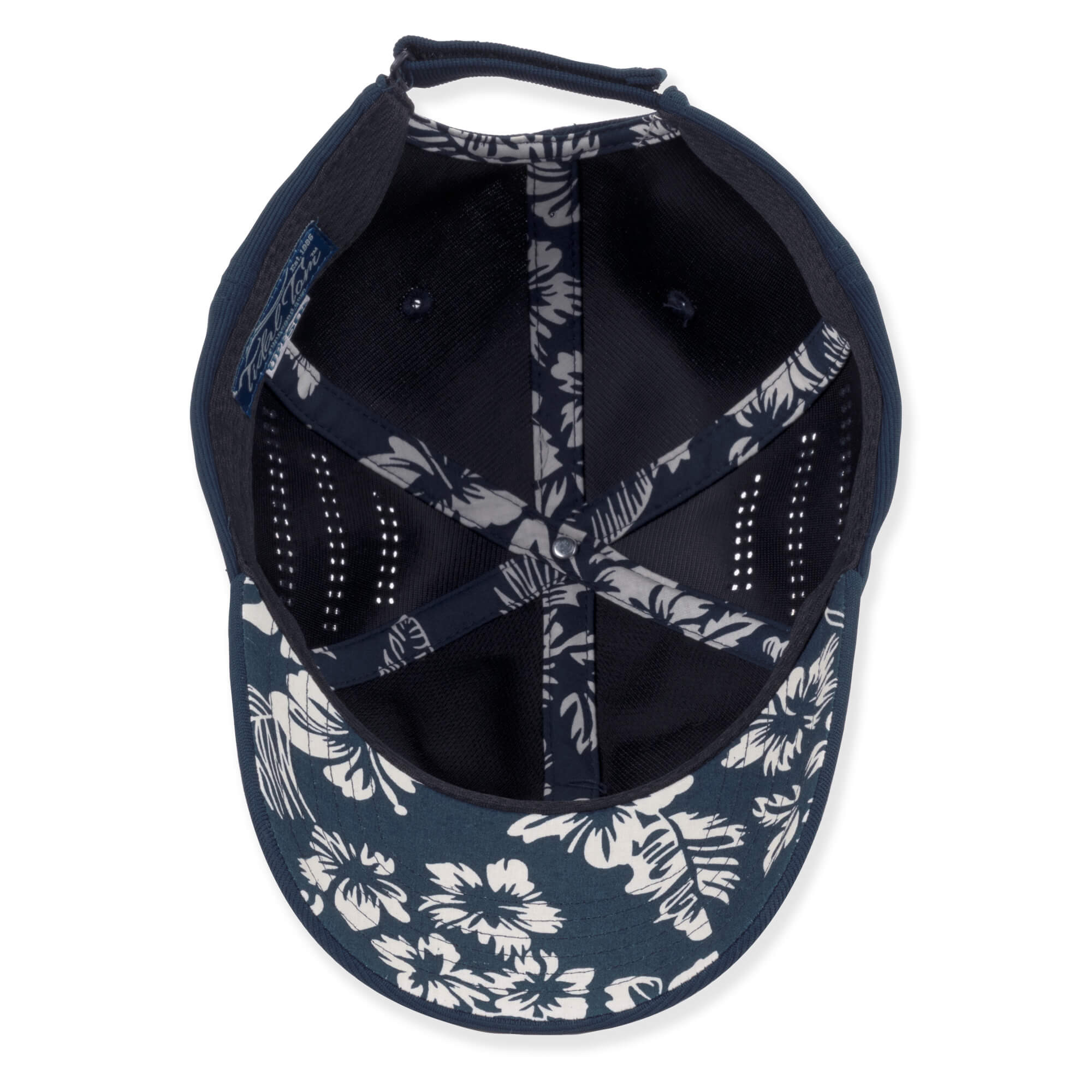 Underbrim View of navy blue baseball cap, textured fabric, curved brim, adjustable strap at back, white patterned lining.