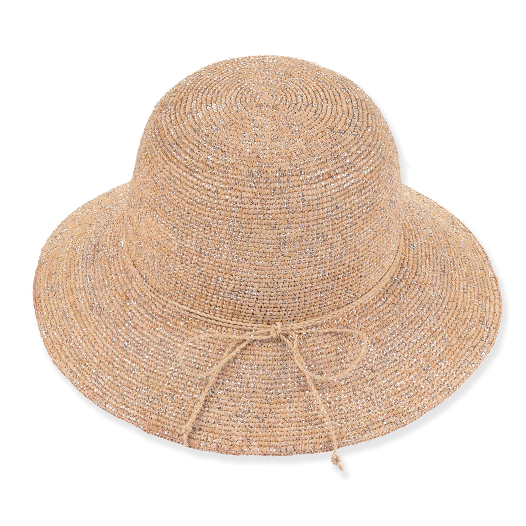Three-quarter profile view of a natural-toned woven straw bucket hat featuring a flat crown, navy fabric band, and metal logo.