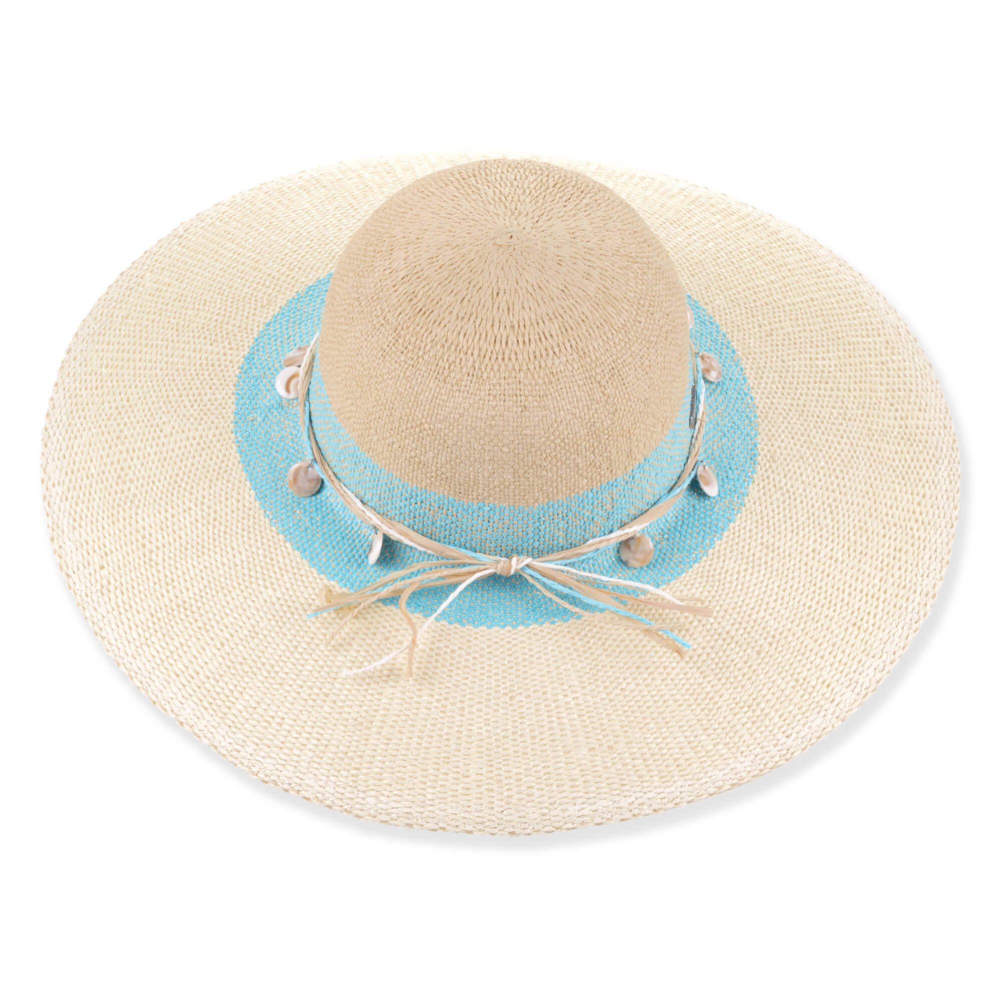 Three-quarter profile view of a tan and ivory woven straw floppy hat featuring a rounded crown, turquoise band, and seashell charms.