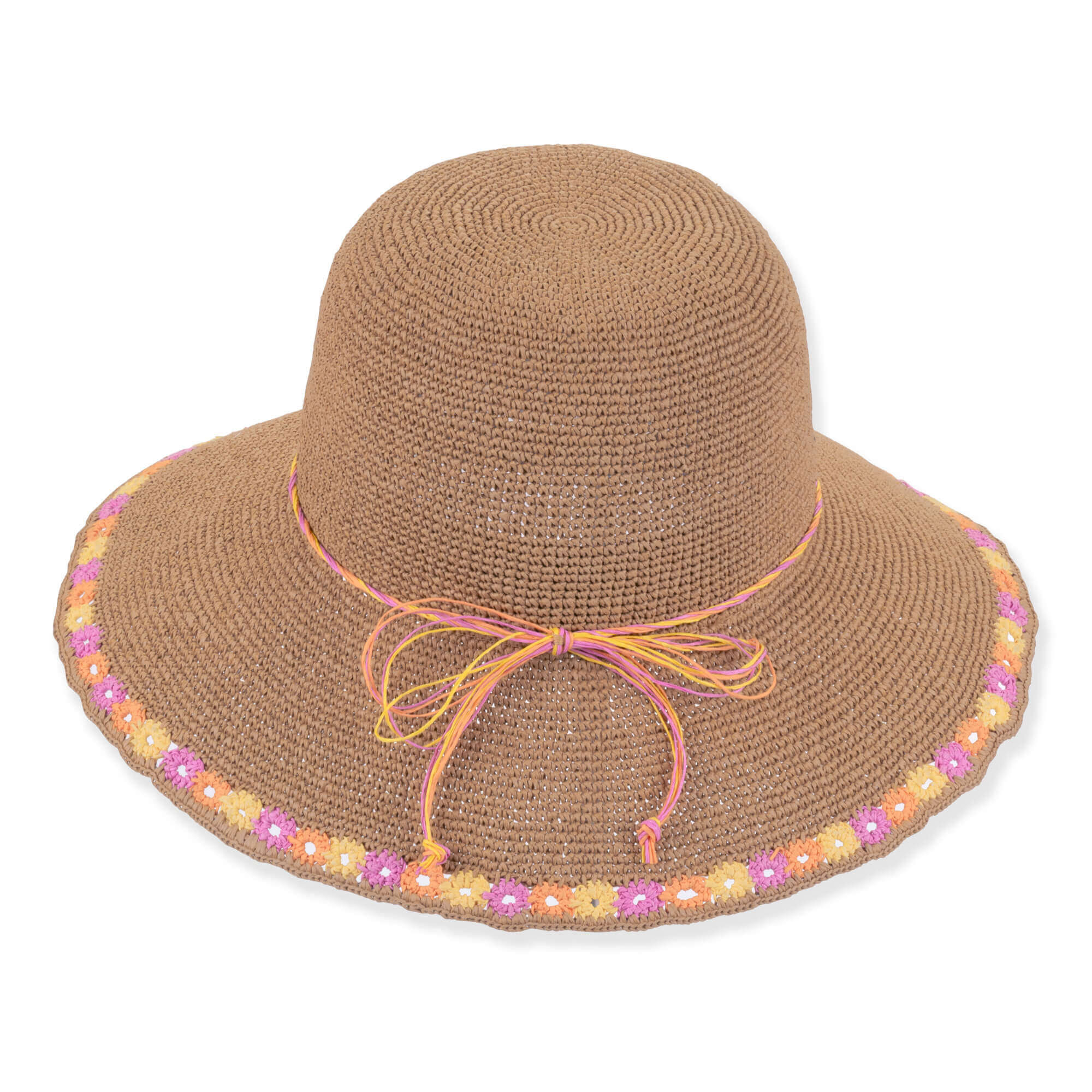 Three-quarter profile view of a dark tan crocheted bucket hat featuring a rounded crown, pink cord band, and floral-embroidered brim.