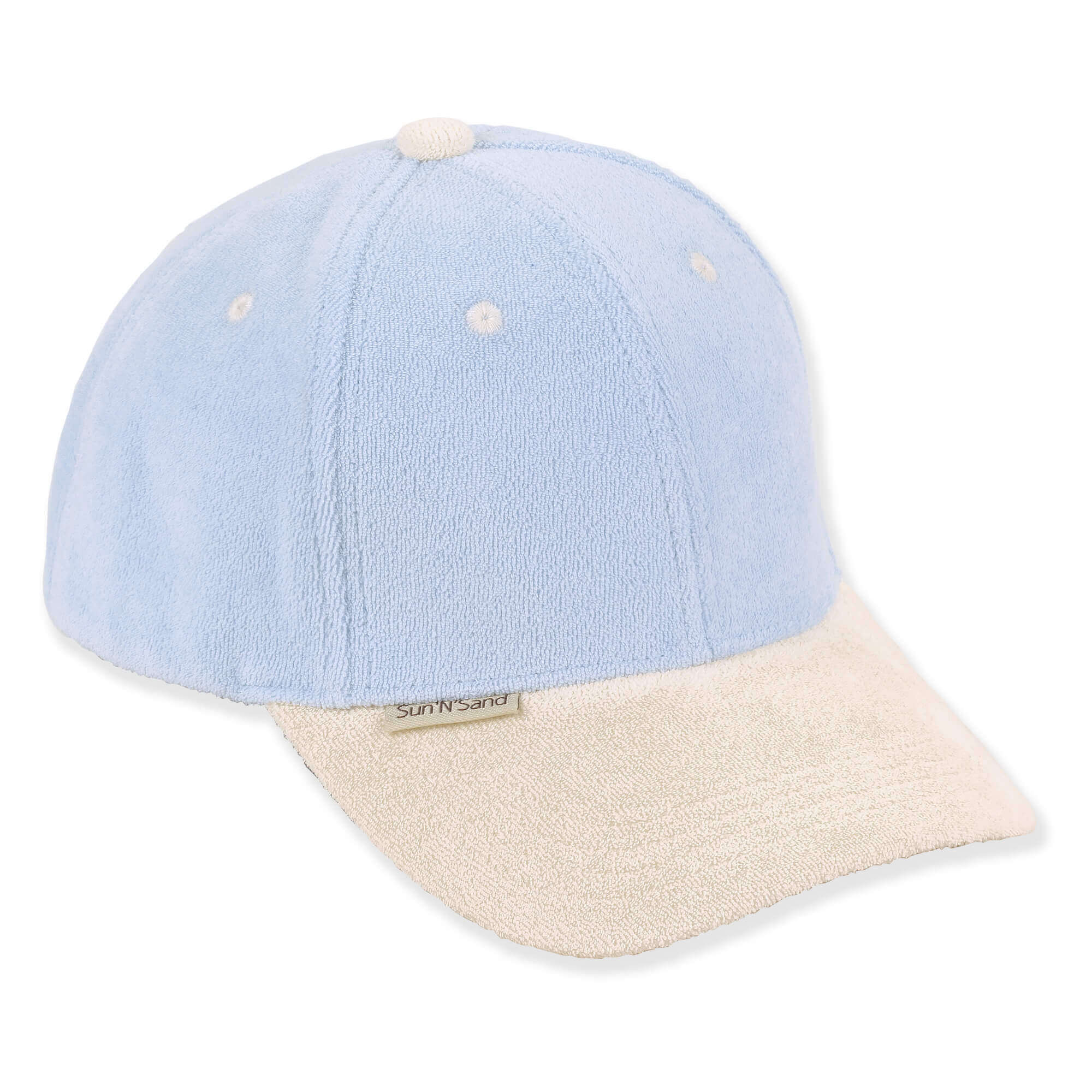 Light blue textured baseball cap with beige brim, six panel crown, ventilation eyelets, small brand tag, shown in clear front angled view.