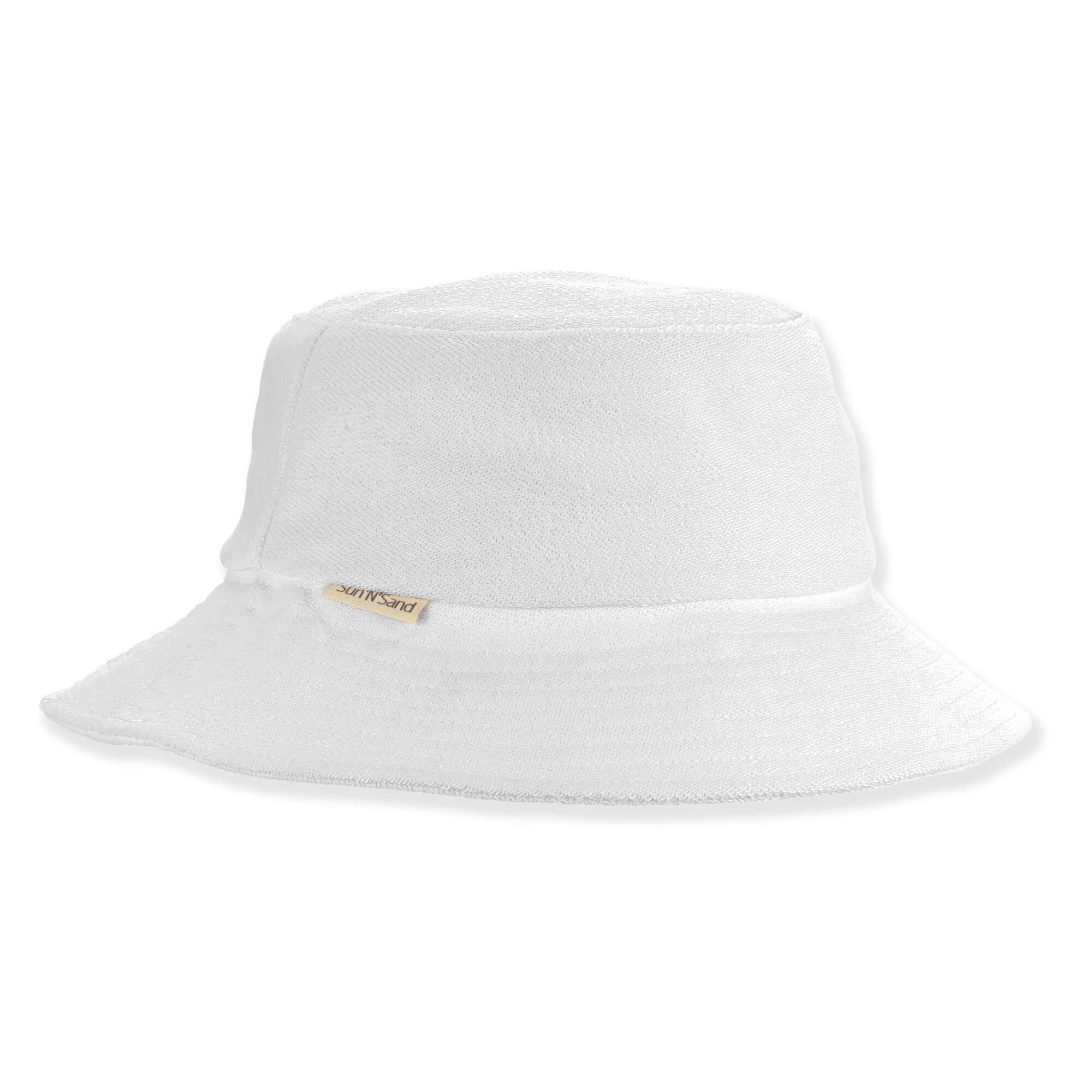 Side view of a soft white terry cloth bucket hat featuring a downward-sloping brim and a small gold metal logo-plate.
