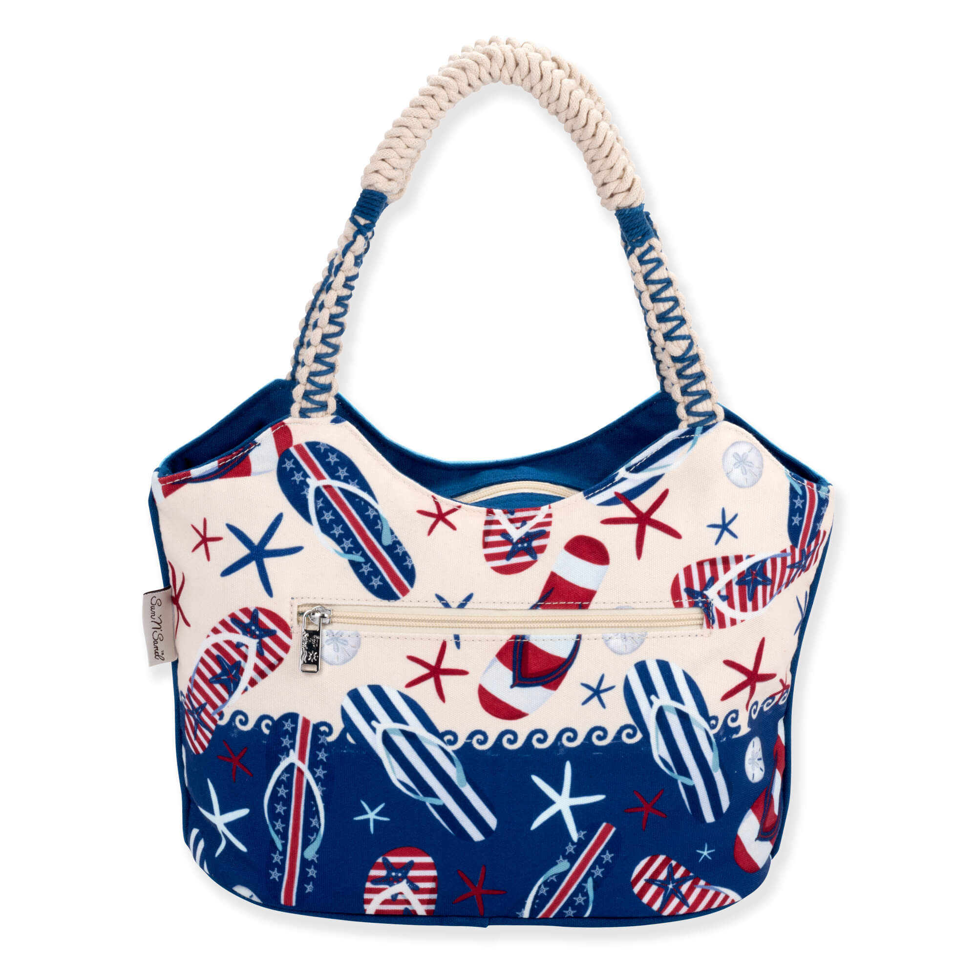 back view of a blue canvas tote featuring patriotic flip-flop graphics, red starfish, braided rope handles, and metal hardware.