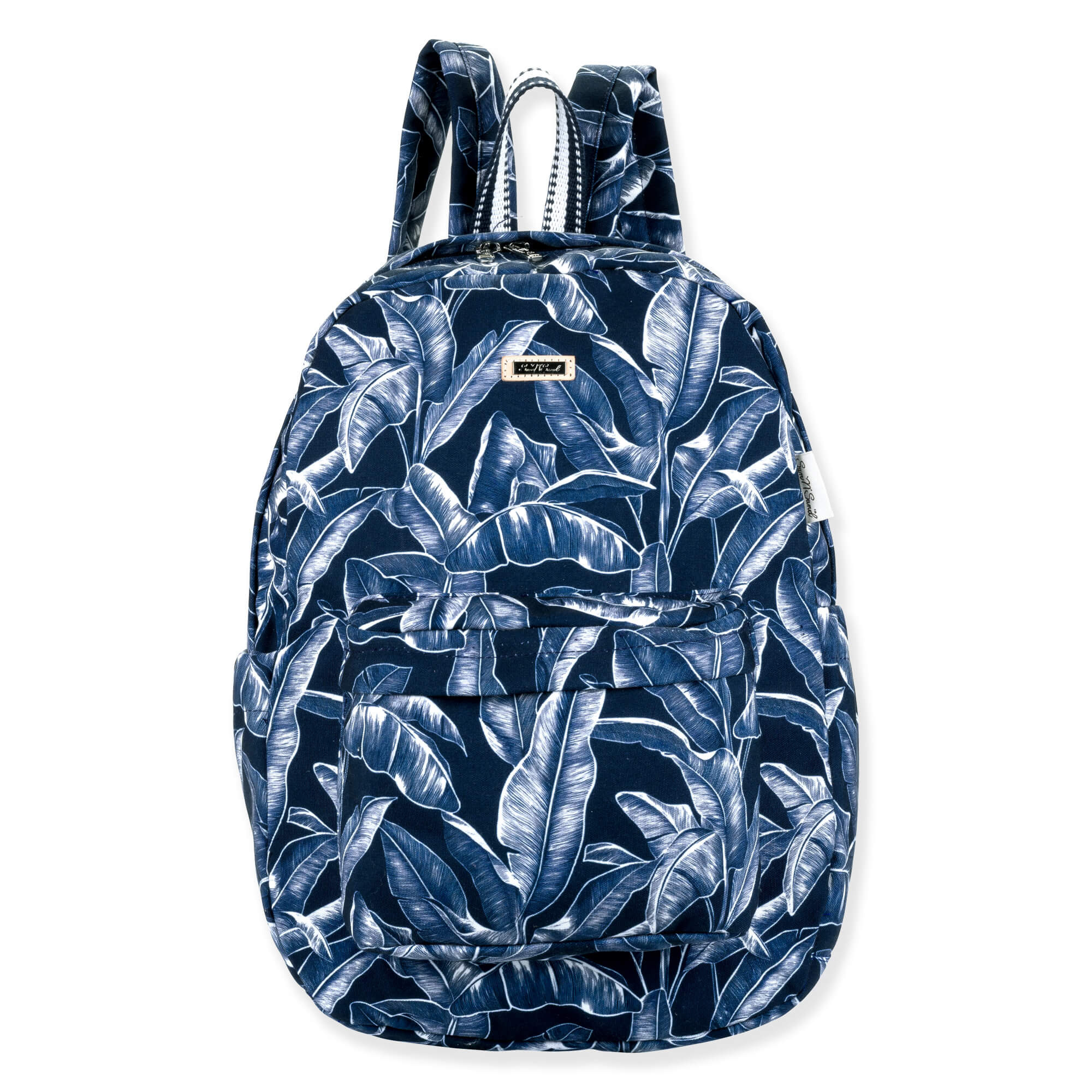 front  view of a large navy tote bag featuring a white tropical leaf print, striped top handles, and metal hardware.