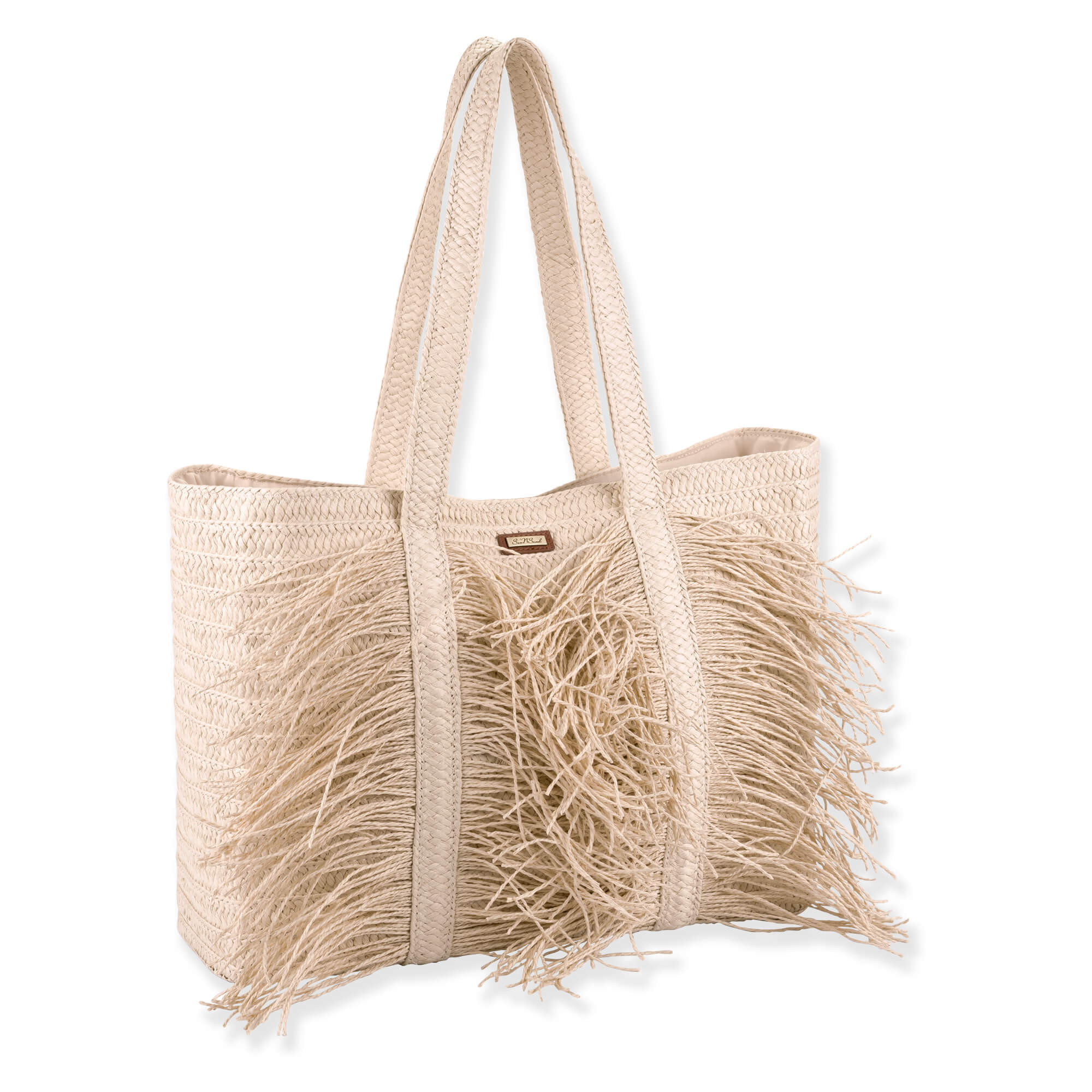 side view of beige woven tote bag with long shoulder straps, dense straw fringe detailing, and structured shape emphasizing natural textured summer design.