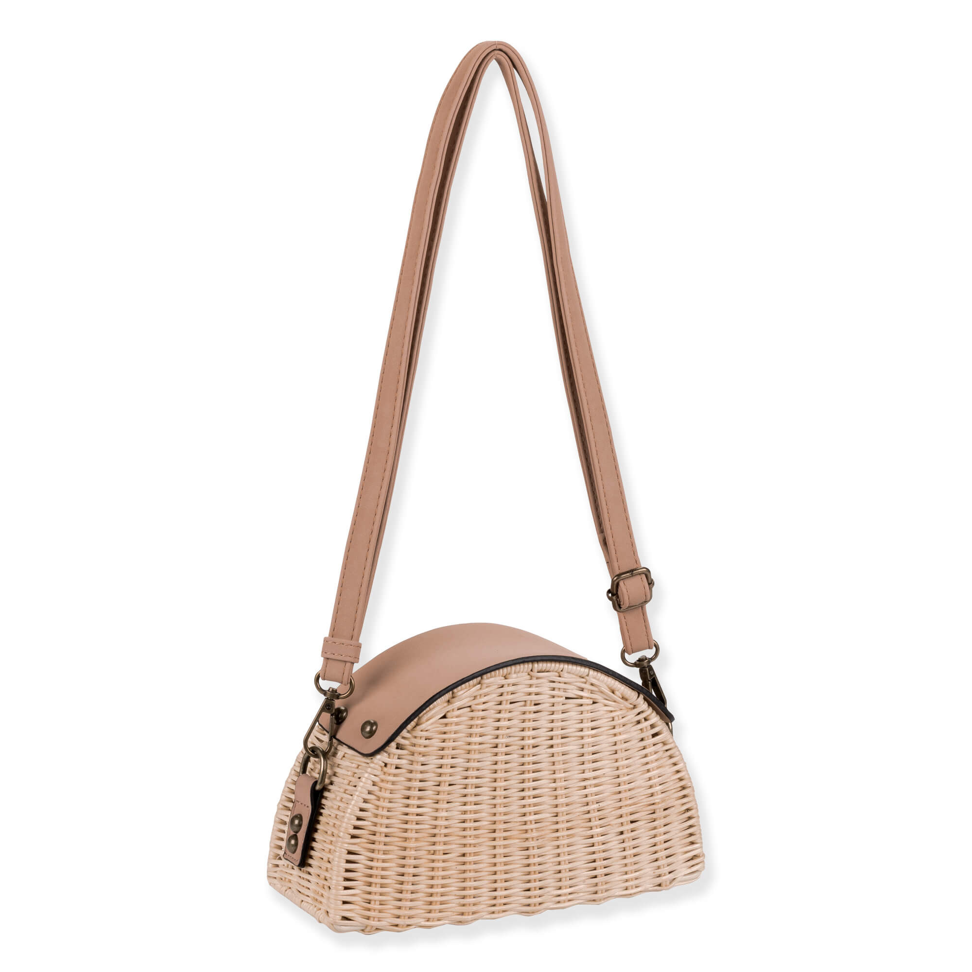 Side view of a half-moon cream wicker bag featuring a smooth tan leather top, adjustable shoulder strap, and antiqued bronze hardware.
