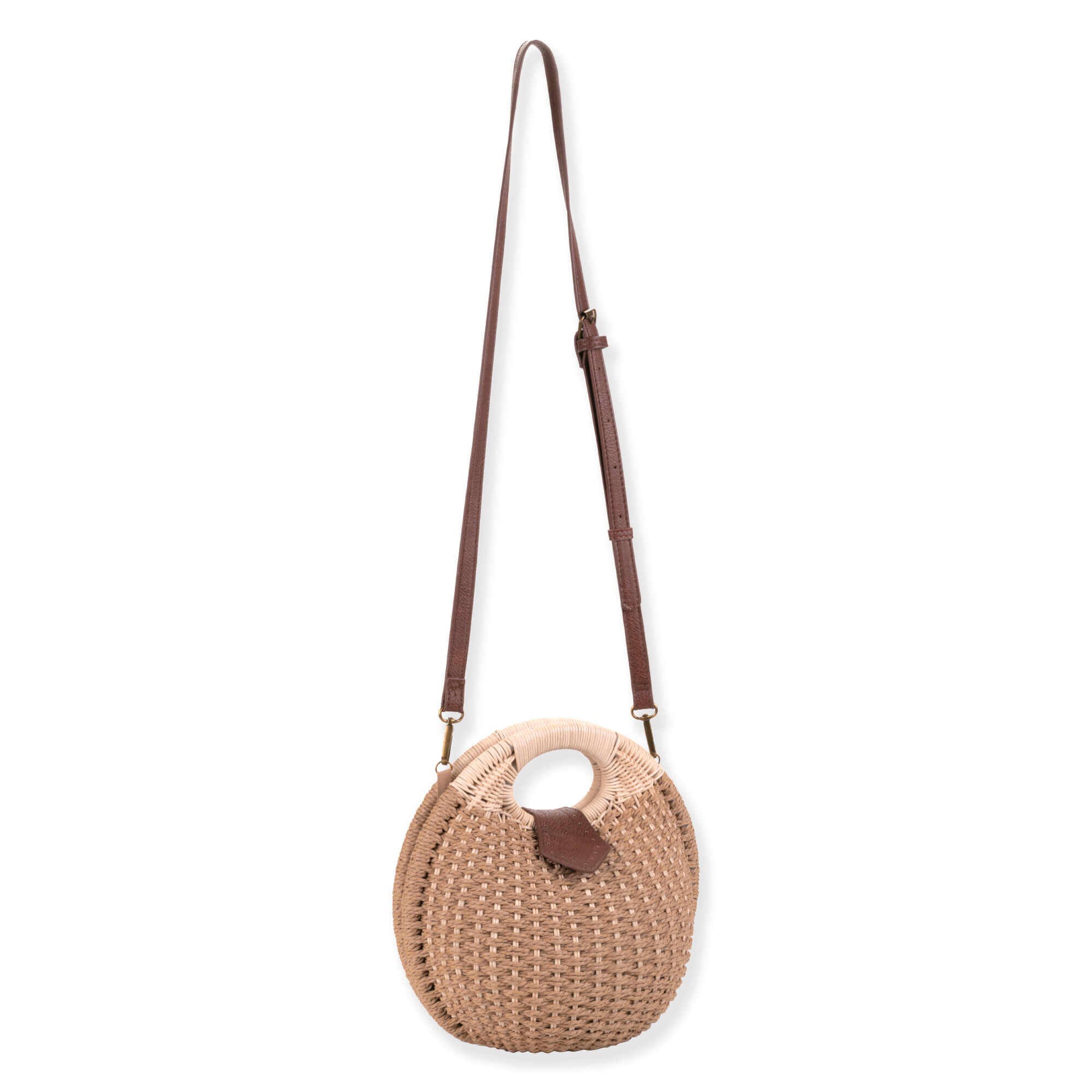 Side view of a brown circular woven bag featuring cream-wrapped top handles, a dark brown adjustable strap, and gold-tone hardware.