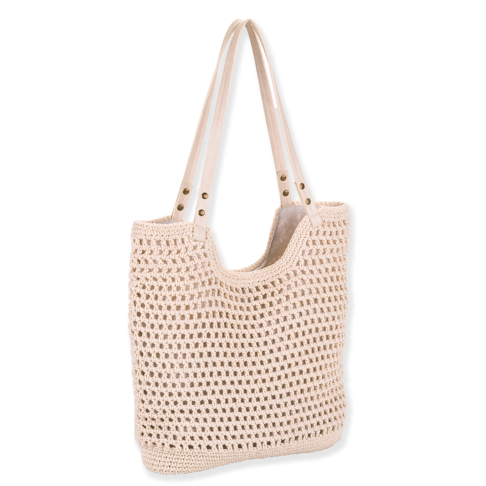 Side view of cream Sun N Sand crochet shoulder tote featuring rectangular open-mesh weave, tan faux-leather straps, and brass rivets.