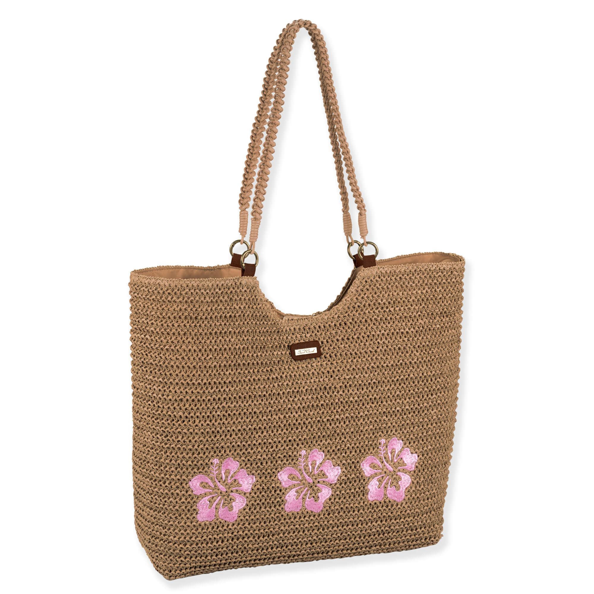 Side view of tan crochet Sun N Sand tote featuring pink embroidered hibiscus flowers, braided rope handles, and gold-tone rings.
