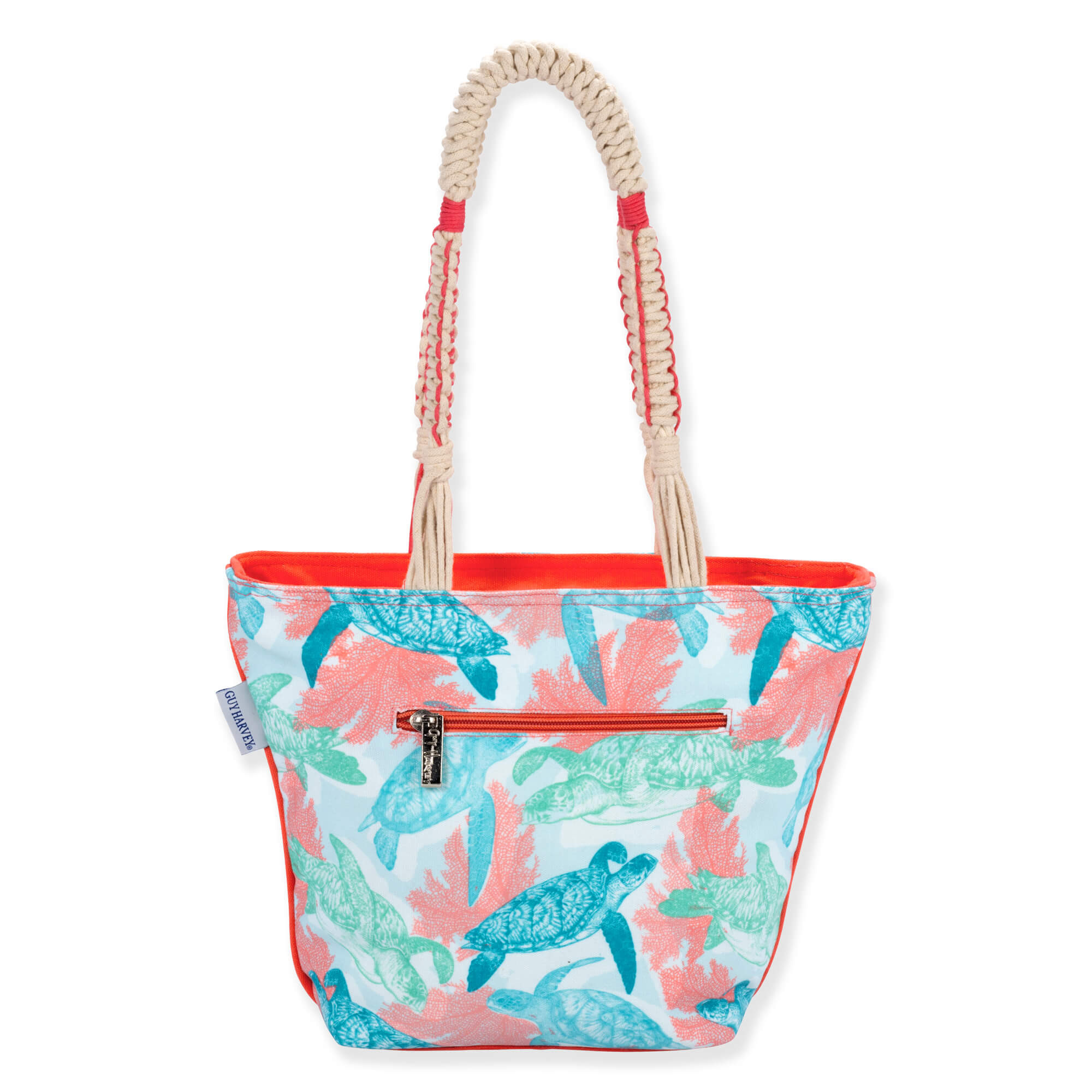 Back view of light blue Guy Harvey Stipple Turtle shoulder tote featuring teal turtle print, orange zippered pocket, and braided rope handles.