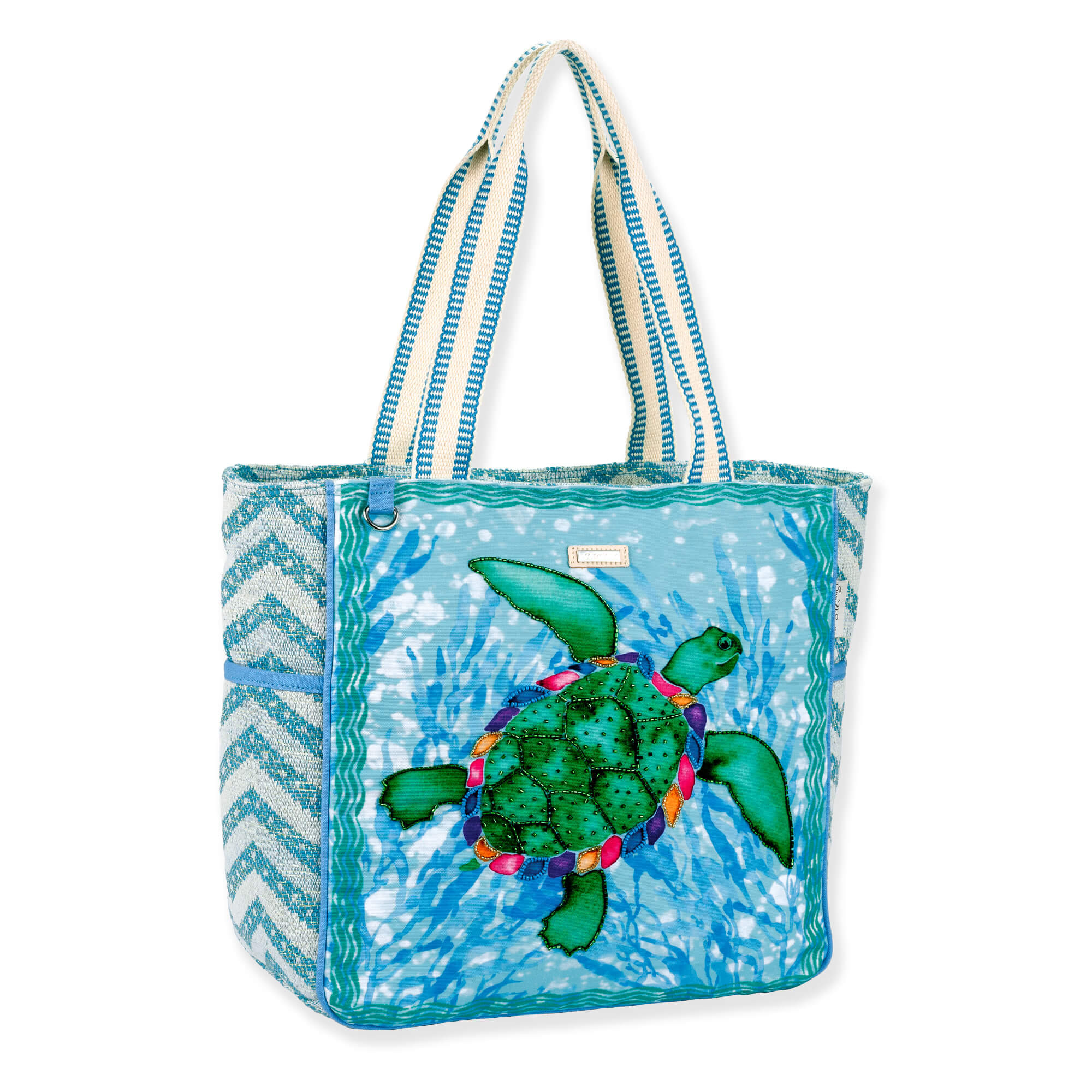 Three-quarter view of teal Sun 'N' Sand Paul Brent Sea Turtle shoulder tote featuring beaded applique, chevron-woven sides, and striped straps.