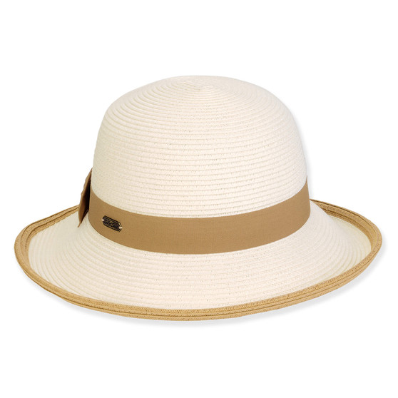 Three-quarter view of a white woven straw sun hat featuring a rounded crown and a tan ribbon band.