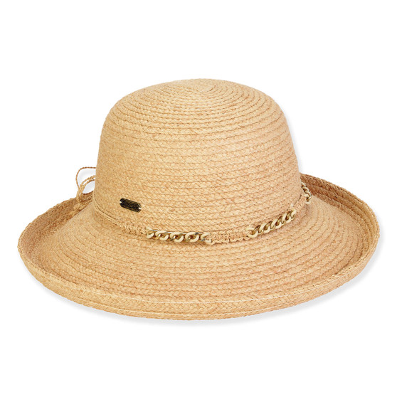 Three-quarter view of a tan woven sun hat featuring a metallic ring-accented cord band and a small brand plaque.