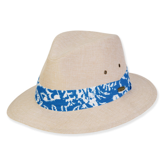 Three-quarter view of a tan linen fedora featuring a blue and white tropical print band and side metal grommets.