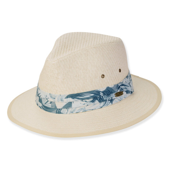 Three-quarter view of a cream straw fedora featuring a blue floral print band, side metal grommets, and oval logo hardware.