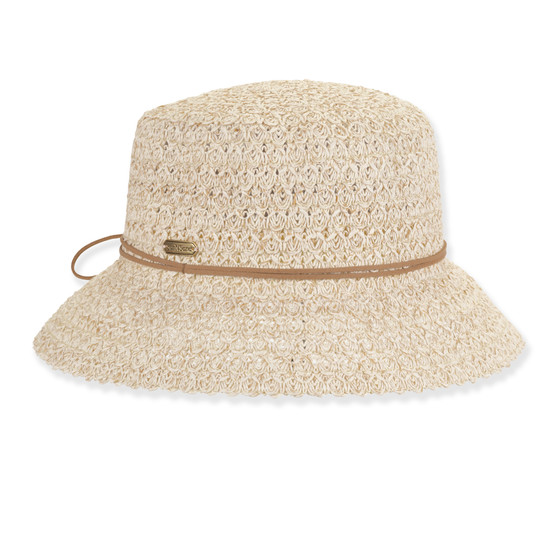 Front view beige woven bucket hat with wide brim, intricate looped straw texture, light brown band, rounded crown, and small metallic tag