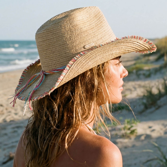 Product studio shot of the Sun N Sand HH3523 Women’s Western Hat in natural-toned woven straw, featuring a vibrant multi-color twisted hatband and a frayed-edge upturned brim for an adjustable fit and UPF 50+ sun protection.
