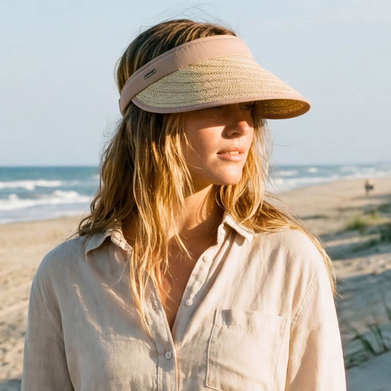 Lifestyle portrait of the Sun N Sand HH3544 Women’s Visor in a natural woven straw, featuring a tan fabric-covered clip-on headband and a wide, curved brim for easy wear and UPF 50+ sun protection.