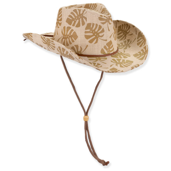 Three-quarter profile view of a tan woven western hat featuring a monstera leaf print, pinched crown, and brown chin cord.