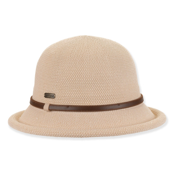 Beige textured bucket hat with rolled brim, dome crown, dark brown leather band and metal emblem shown in clear front angled view.