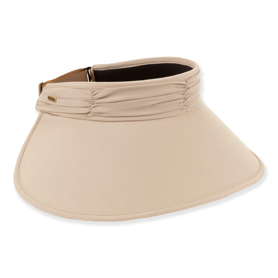 Front angled view of beige gathered band sun visor with wide curved brim, soft textured fabric, and small metallic side tag providing UPF 50+ protection.