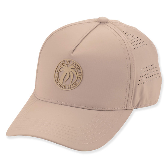 Three-quarter profile view of a tan performance ball cap featuring a structured crown, perforated side panels, and rubberized palm logo.