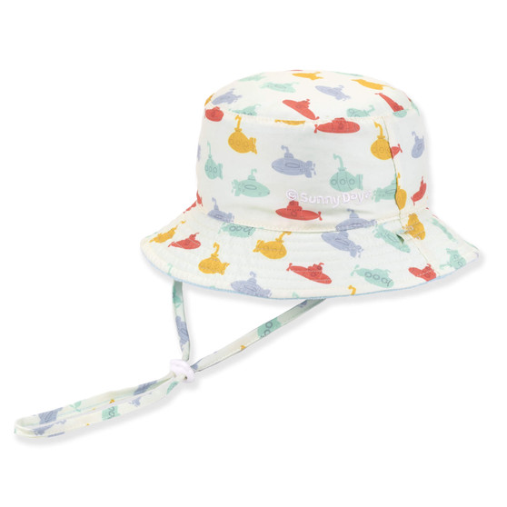Three-quarter view of a white bucket hat featuring colorful submarine prints and an adjustable light blue patterned chin strap.