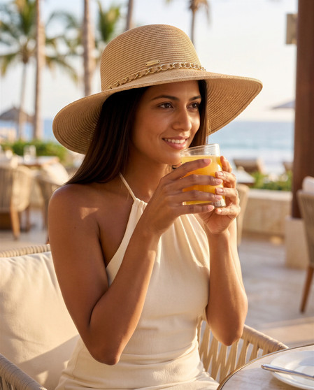 Tan floppy hat featuring Adjustable, UPF 50+.