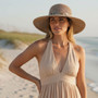Front angled view of the Sun N Sand floppy hat in soft paper braid, featuring wide draped brim and adjustable UPF‑protection design.