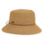 Front view beige woven bucket hat with wide brim, intricate interlaced straw texture, thin brown band, rounded crown, and small metallic tag