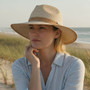 Lifestyle portrait of the Sun N Sand HH3506 Women’s Safari Hat in natural-toned woven straw, featuring an intricate open-work embroidered hatband and a structured crown for an adjustable fit and UPF 50+ sun protection.