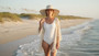 Lifestyle portrait of the Sun N Sand HH3613 Women’s Floppy Hat in a natural woven straw, featuring a decorative black-and-white patterned hatband with a side metallic brand plate and a wide, structured floppy brim for an adjustable fit.