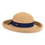 Front view woven beige upbrim hat with wide curved brim, rounded crown, textured straw weave, navy band, and small metallic emblem.
