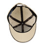Underside of beige baseball cap showing patterned lining, six-panel construction, and structured brim.