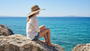 Front angled view of the Sun N Sand floppy hat in soft paper braid, featuring wide flowing brim and adjustable UPF‑protection design.