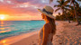 Front angled view of the Sun N Sand boater hat in natural straw, featuring navy‑striped ribbon band and adjustable design for UPF protection.
