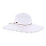 White woven floppy hat with scalloped brim, concentric stitching, tan decorative string, small metallic side emblem, shown in clear front angled view.