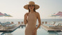 Lifestyle portrait of the Sun N Sand HH3636 Women’s Boater Hat in a natural tan woven straw, featuring a contrasting black ribbon hatband with a side metallic brand plate and a wide, structured flat brim with a flat crown for an adjustable fit and UPF