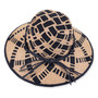 Three-quarter profile view of a toasted-brown woven straw western hat featuring a pinched crown, star-studded faux-leather band, and curved brim.