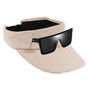 Three-quarter profile view of a tan performance fabric visor featuring perforated side panels, sunglass holder loops, and adjustable rear clasp.