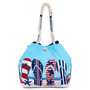 Front view of a rectangular blue crossbody bag featuring patriotic flip-flop graphics, red starfish, striped trim, and metal hardware.