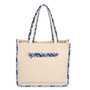 back view of a rectangular beige burlap tote set with blue shibori print starfish, trim, matching zippered pouch, and metal hardware.