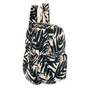side  view of a rounded black backpack featuring a light beige leaf print, zippered pocket, and silver-toned logo plate.
