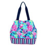 front Three-quarter view of a large tote bag featuring a vibrant coral reef print, navy and pink striped base, and navy straps.