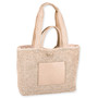 Side view of cream Sun N Sand crochet tote featuring metallic gold faux-leather pocket, short rolled handles, and braided shoulder straps.
